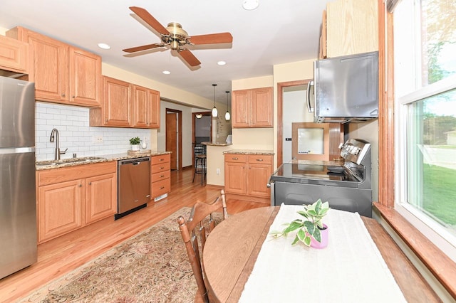 2377 S 73rd St, West Allis, WI 53219 - kitchen with appliances with stainless steel finishes, light brown cabinetry, a sink, light wood-type flooring, and recessed lighting