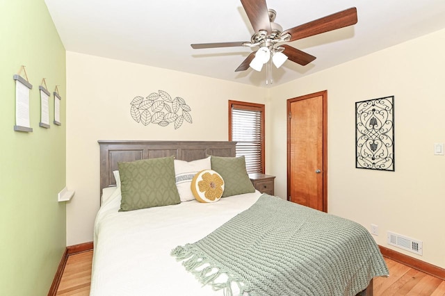 2377 S 73rd St, West Allis, WI 53219 - bedroom featuring baseboards, light wood-style flooring, and a ceiling fan