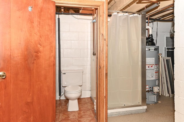 2377 S 73rd St, West Allis, WI 53219 - full bathroom featuring water heater, a stall shower, toilet, and concrete block wall
