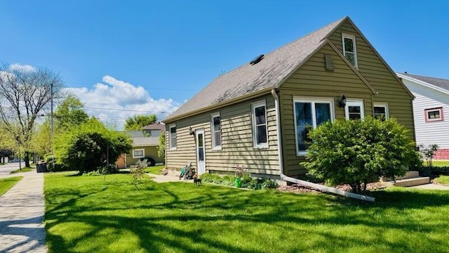 2377 S 73rd St, West Allis, WI 53219 - view of property exterior with a yard