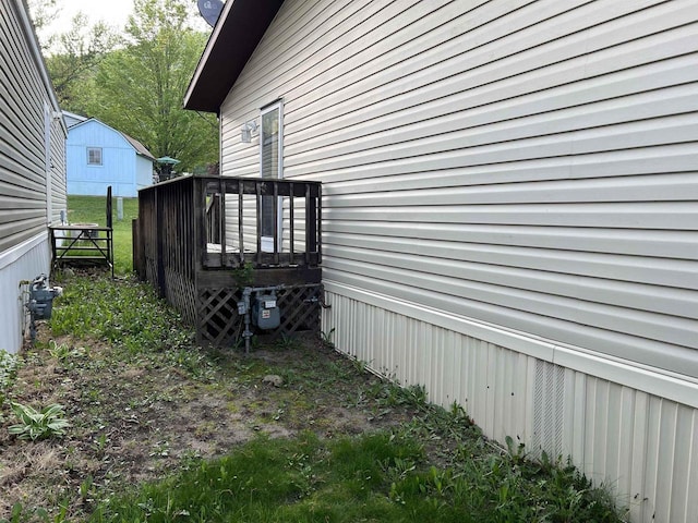 view of home's exterior with fence
