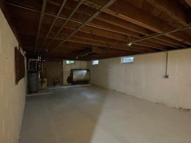 1546-15461/2 Garfield Ave, Beloit, WI 53511 - basement with water heater and heating fuel