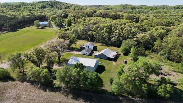 18051 Ideal Rd, Sparta, WI 54656 - aerial view of property and surrounding area featuring a heavily wooded area