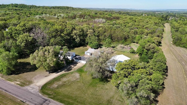 18051 Ideal Rd, Sparta, WI 54656 - aerial view of property and surrounding area featuring a heavily wooded area