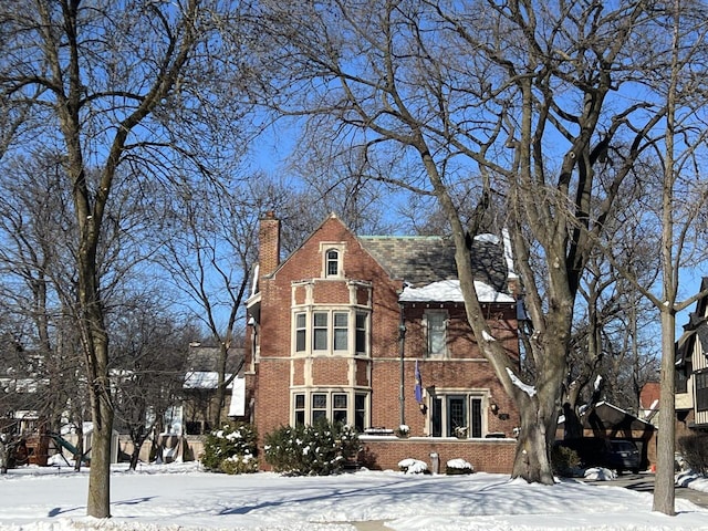 2663 N Wahl Ave, Milwaukee, WI 53211 - view of front of house with brick siding and a chimney