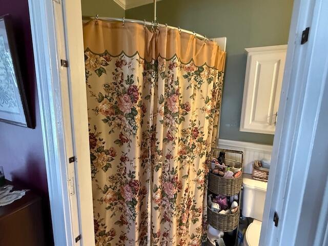 400 S Water St, Sparta, WI 54656 - bathroom featuring toilet and a shower with shower curtain