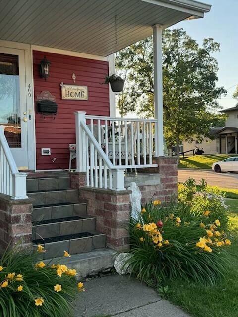 400 S Water St, Sparta, WI 54656 - doorway to property featuring covered porch