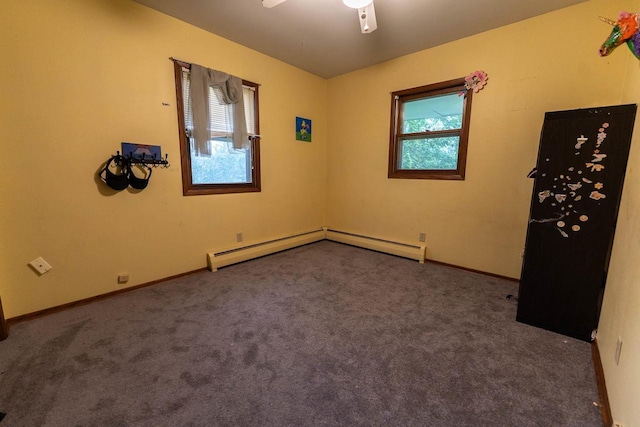 105 Glenview Dr, Tomah, WI 54660 - unfurnished room with a ceiling fan, carpet, baseboards, and a baseboard radiator