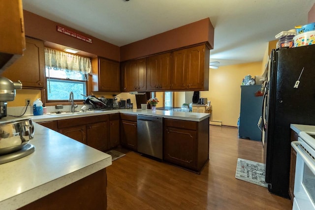 105 Glenview Dr, Tomah, WI 54660 - kitchen featuring dishwasher, a sink, a peninsula, white range with electric stovetop, and light countertops