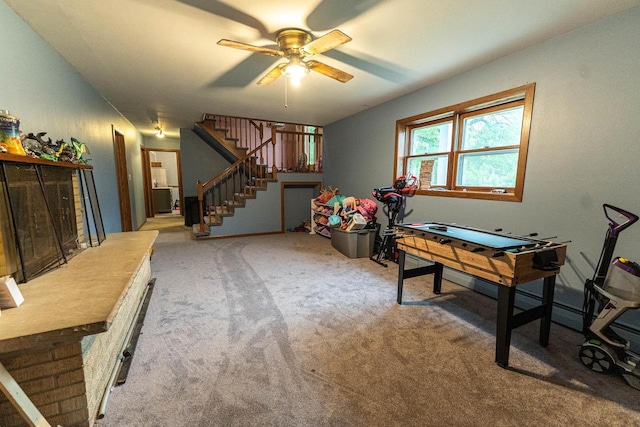 105 Glenview Dr, Tomah, WI 54660 - rec room featuring a ceiling fan and carpet