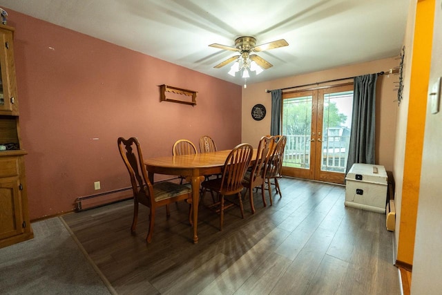 105 Glenview Dr, Tomah, WI 54660 - dining space with french doors, dark wood-type flooring, ceiling fan, and a baseboard heating unit