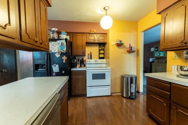 105 Glenview Dr, Tomah, WI 54660 - kitchen featuring white electric stove, light countertops, dark wood-type flooring, dishwasher, and decorative light fixtures