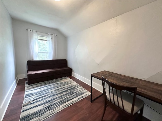 403 Dwight St, Chippewa Falls, WI 54729 - living area with lofted ceiling, dark wood-style flooring, and baseboards