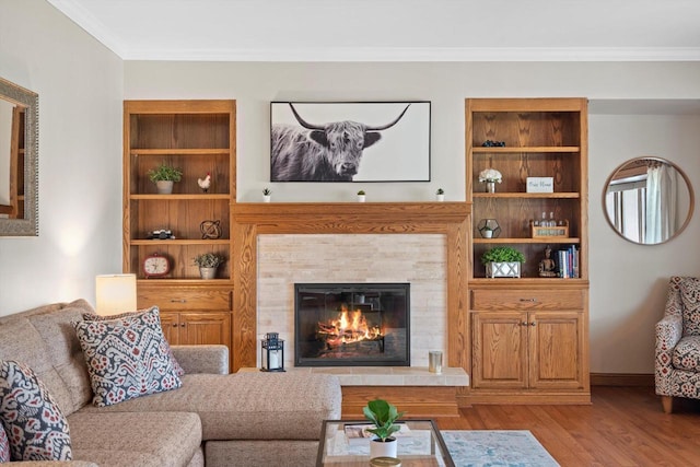 4531 Tabor Rd, Racine, WI 53402 - living room with crown molding, wood finished floors, and a tile fireplace