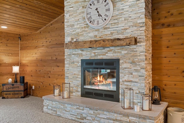 4531 Tabor Rd, Racine, WI 53402 - living area featuring wood ceiling, carpet floors, a stone fireplace, vaulted ceiling, and wood walls