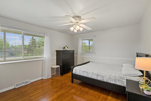 4531 Tabor Rd, Racine, WI 53402 - bedroom with wood finished floors, baseboards, and a ceiling fan