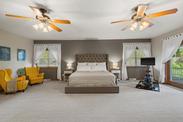 4531 Tabor Rd, Racine, WI 53402 - bedroom with carpet, multiple windows, and access to exterior