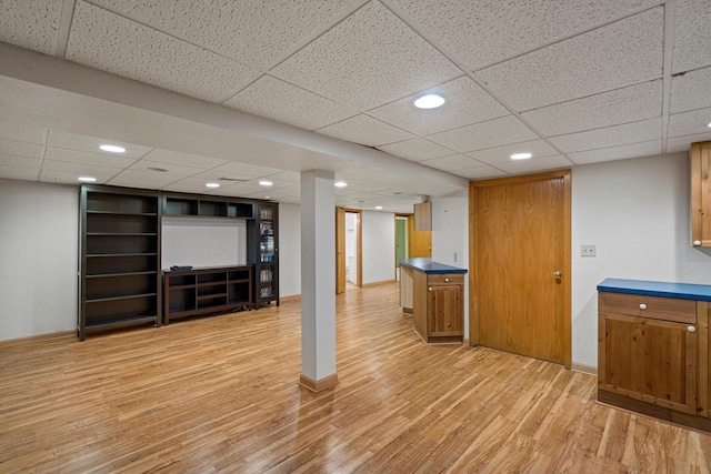 4531 Tabor Rd, Racine, WI 53402 - finished below grade area featuring light wood-style flooring, a drop ceiling, recessed lighting, and baseboards