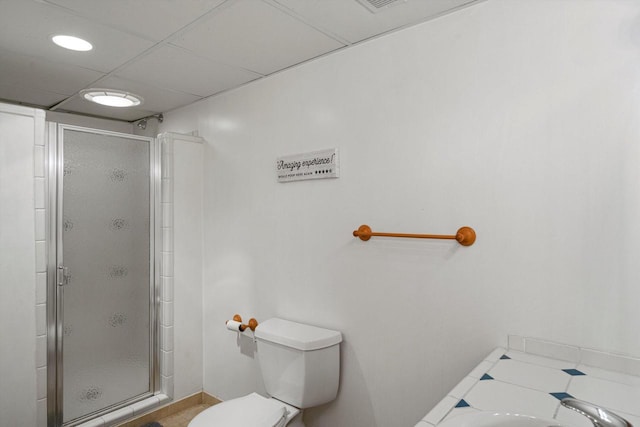 4531 Tabor Rd, Racine, WI 53402 - full bath with a shower stall, toilet, and baseboards