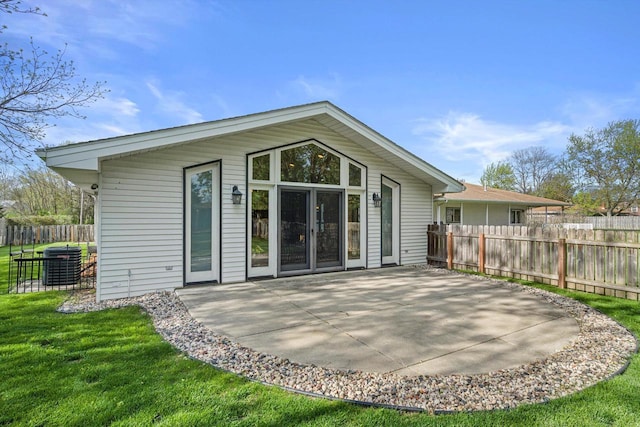 4531 Tabor Rd, Racine, WI 53402 - back of property with central AC and a patio