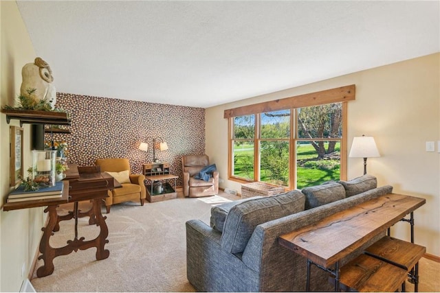 2929 170th St, Frederic, WI 54837 - living room featuring carpet flooring, an accent wall, and baseboards