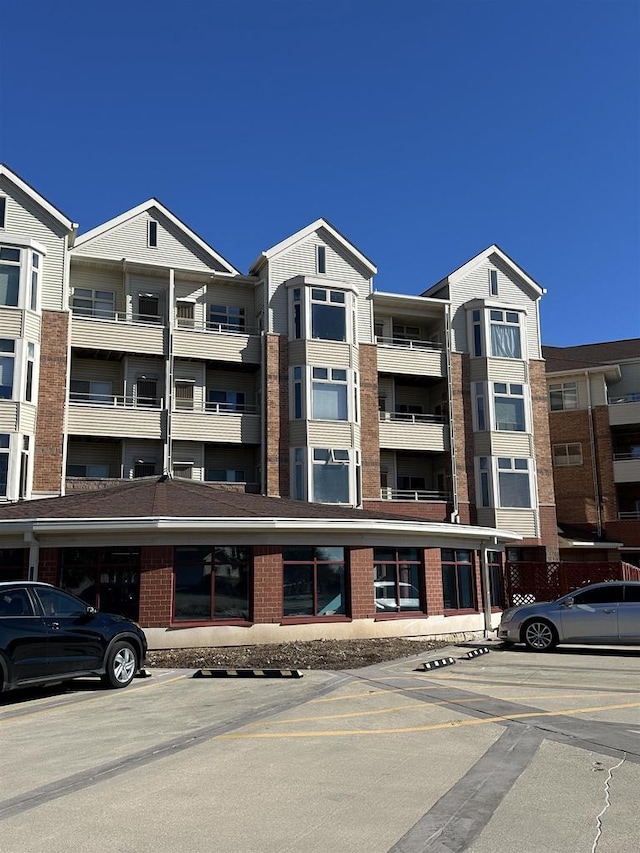 301 Harbour Town Dr Unit 227, Madison, WI 53717 - view of apartment building / complex with uncovered parking