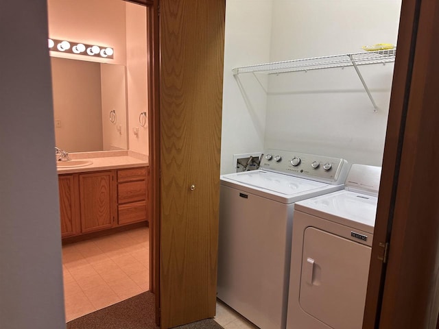 301 Harbour Town Dr Unit 227, Madison, WI 53717 - laundry area with washer and dryer and a sink