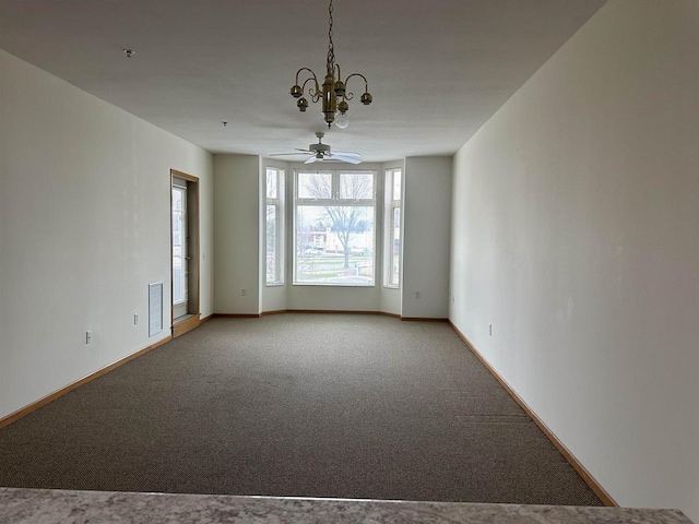 301 Harbour Town Dr Unit 227, Madison, WI 53717 - empty room featuring a chandelier, light colored carpet, baseboards, and ceiling fan