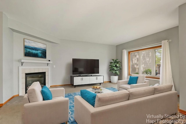 4669 S Forest Point Blvd, New Berlin, WI 53151 - living area with baseboards, a tile fireplace, and carpet flooring