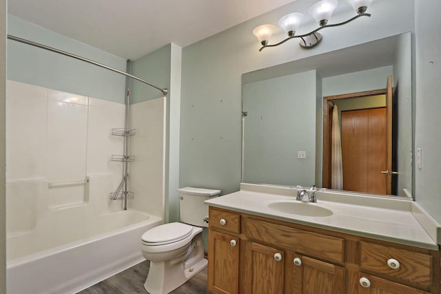 4669 S Forest Point Blvd, New Berlin, WI 53151 - bathroom with toilet, wood finished floors, vanity, and tub / shower combination