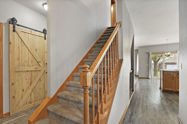 4669 S Forest Point Blvd, New Berlin, WI 53151 - stairs with wood finished floors, a barn door, and baseboards
