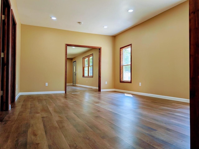 73 Church St, Montello, WI 53949 - unfurnished room featuring wood finished floors, recessed lighting, and baseboards