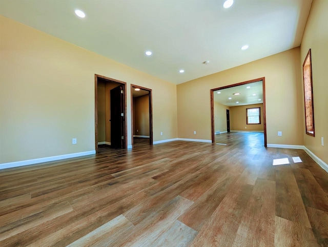 73 Church St, Montello, WI 53949 - unfurnished room with wood finished floors, recessed lighting, and baseboards