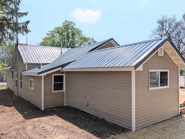 73 Church St, Montello, WI 53949 - view of side of property with metal roof