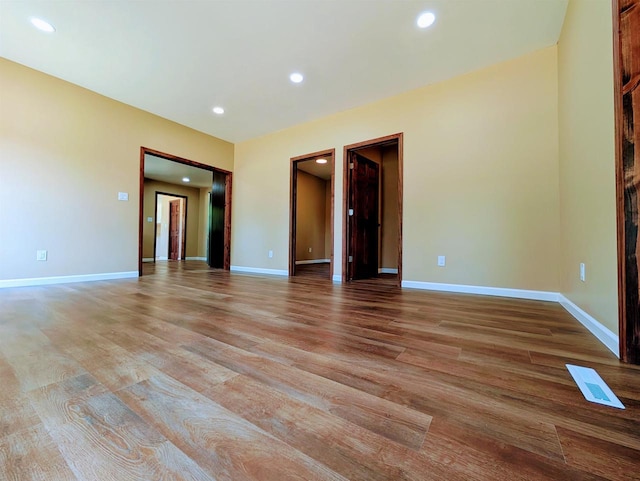 73 Church St, Montello, WI 53949 - spare room featuring light wood-style floors, recessed lighting, and baseboards