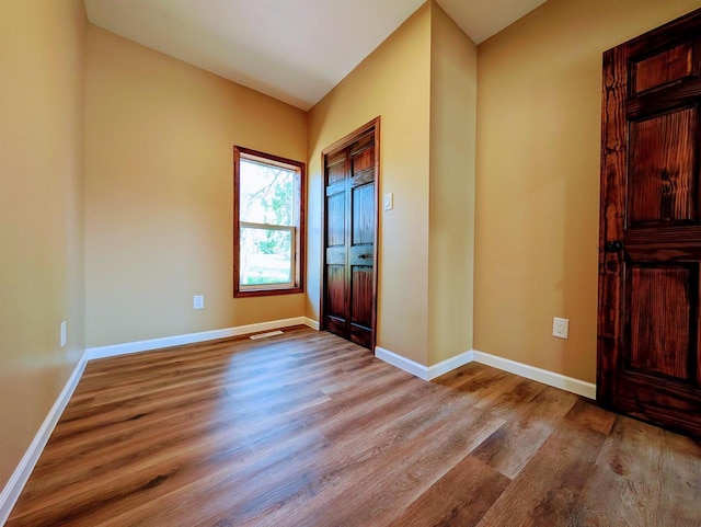 73 Church St, Montello, WI 53949 - foyer entrance with wood finished floors and baseboards