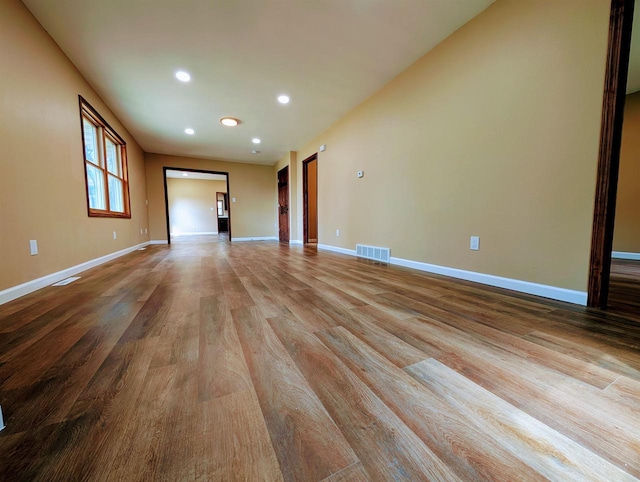 73 Church St, Montello, WI 53949 - empty room with recessed lighting, baseboards, and wood finished floors
