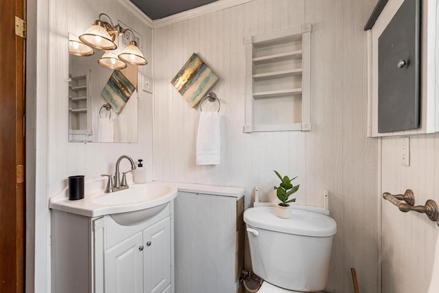 131 S Sidney St, Kimberly, WI 54136 - bathroom with toilet, ornamental molding, and vanity