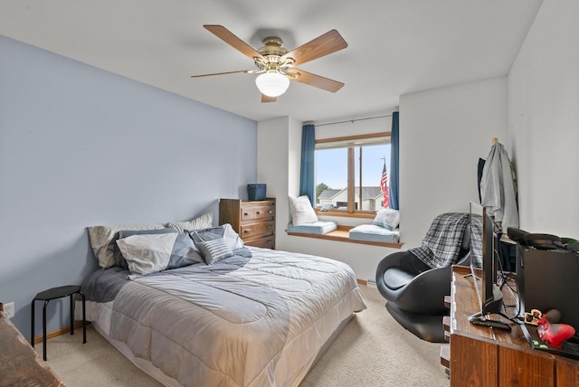 1500 Wolf Dr, West Bend, WI 53090 - bedroom featuring light carpet, baseboards, and a ceiling fan