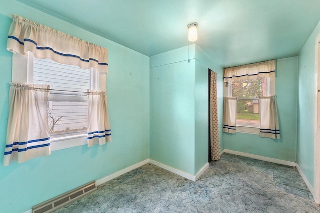 407 E Franklin St, Portage, WI 53901 - unfurnished room featuring carpet floors and baseboards