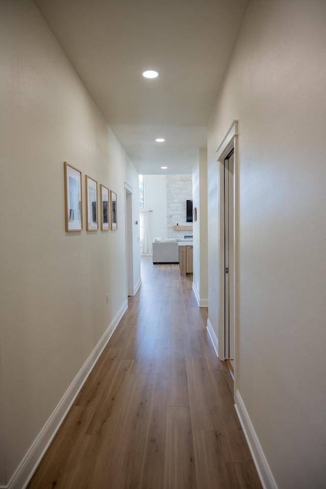 W5613 37th St, New Lisbon, WI 53950 - hallway with dark wood-style floors, recessed lighting, and baseboards