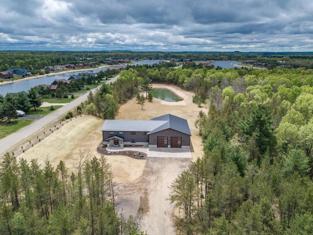W5613 37th St, New Lisbon, WI 53950 - drone / aerial view of a large body of water and a heavily wooded area