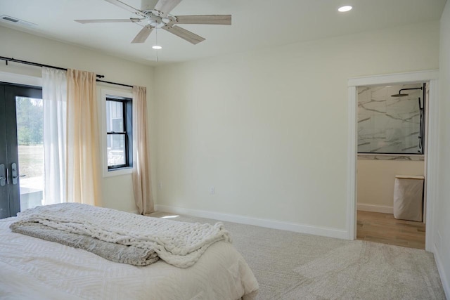 W5613 37th St, New Lisbon, WI 53950 - bedroom with carpet flooring, recessed lighting, baseboards, a walk in closet, and a ceiling fan