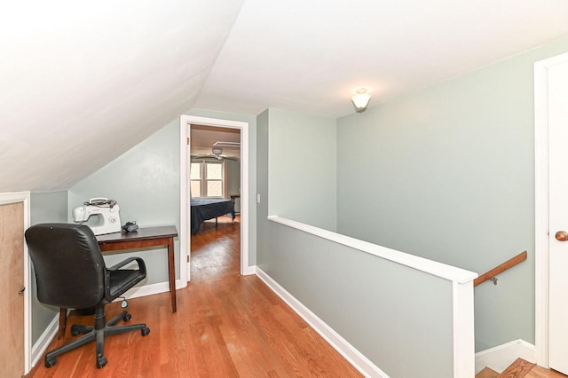 134 W Roberta Ave, Waukesha, WI 53186 - office space featuring wood finished floors, vaulted ceiling, and baseboards