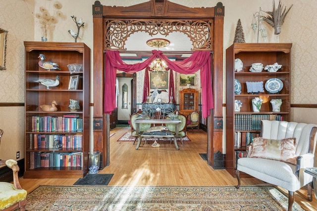 503 E Conant St, Portage, WI 53901 - living area featuring wallpapered walls and wood finished floors