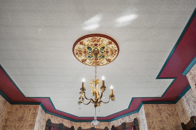 503 E Conant St, Portage, WI 53901 - detailed view of crown molding, a chandelier, and wallpapered walls