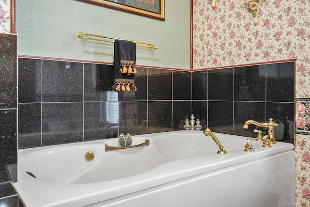 503 E Conant St, Portage, WI 53901 - bathroom with wallpapered walls and a bath