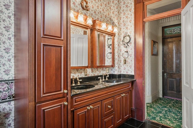 503 E Conant St, Portage, WI 53901 - bathroom featuring wallpapered walls, double vanity, and tile patterned flooring