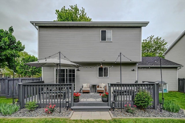 5438 Park Meadow Dr, Madison, WI 53704 - back of property with a wooden deck and outdoor lounge area