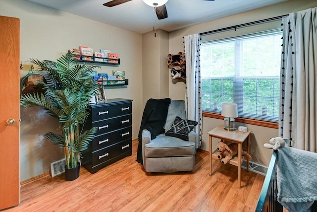 5438 Park Meadow Dr, Madison, WI 53704 - living area featuring ceiling fan, wood finished floors, healthy amount of natural light, and baseboards